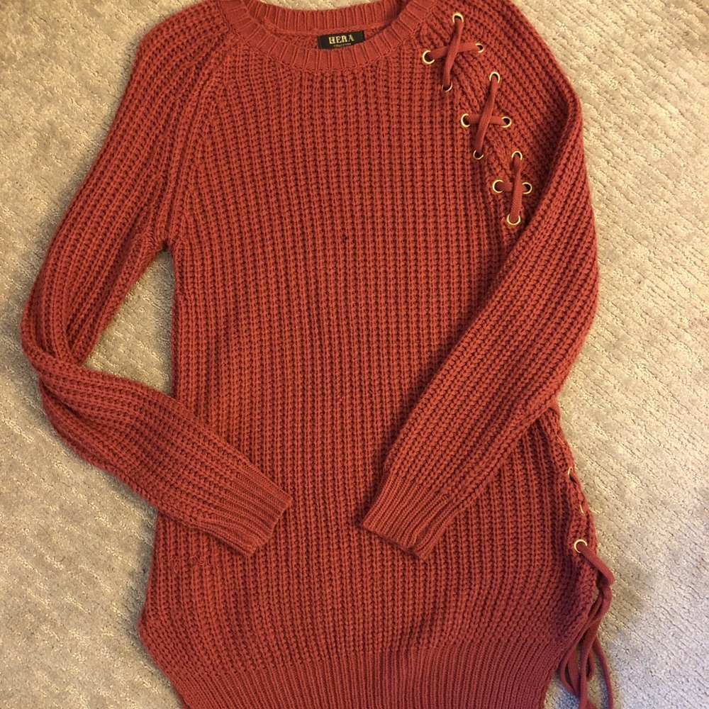 Salmon colored lace up sweater